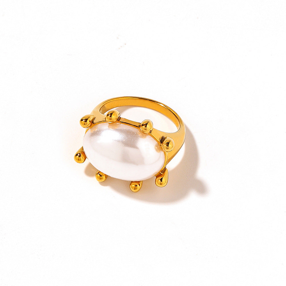 Vintage gold-tone layered open ring with polished bead accents