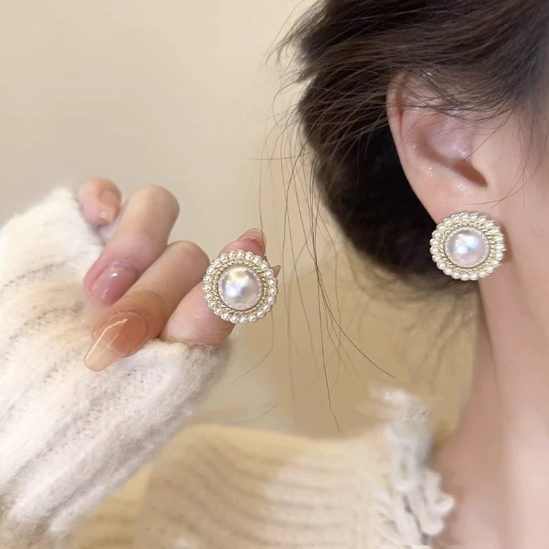 Baroque pearl halo stud earrings with gold-tone and crystal-style detailing