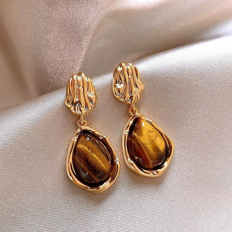 Vintage tiger eye drop earrings with gold-tone teardrop setting