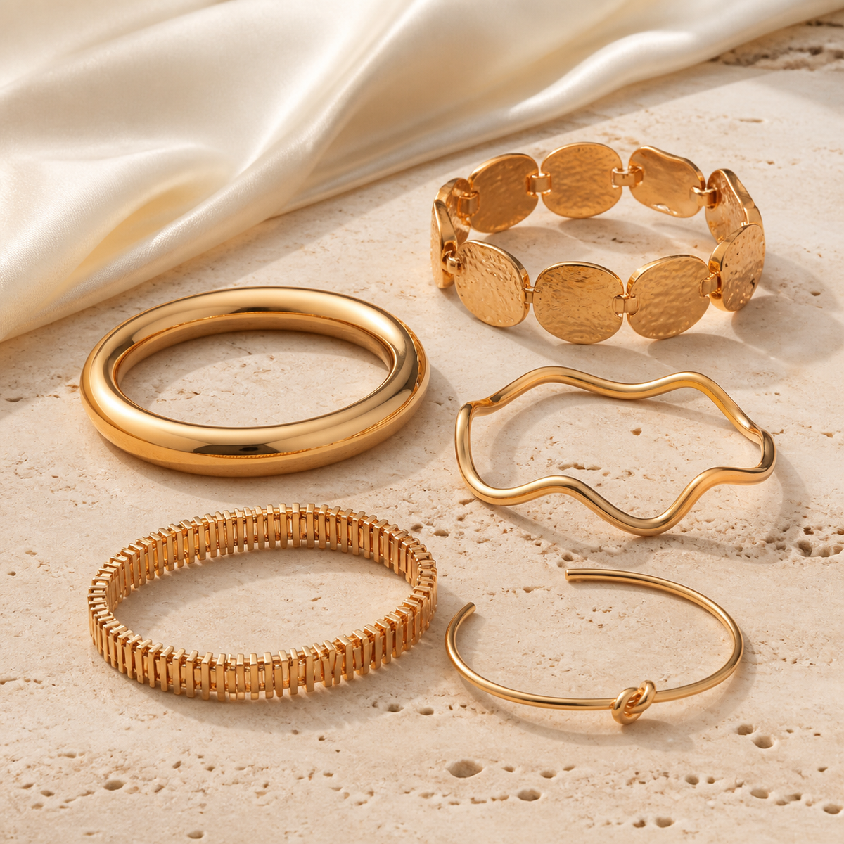 Gold Sculptural Stacking Bangle Set — five-piece bracelet set