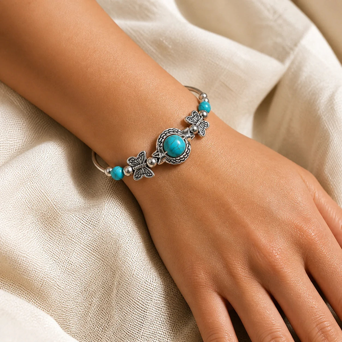 Retro Turquoise Butterfly Bracelet worn on the wrist